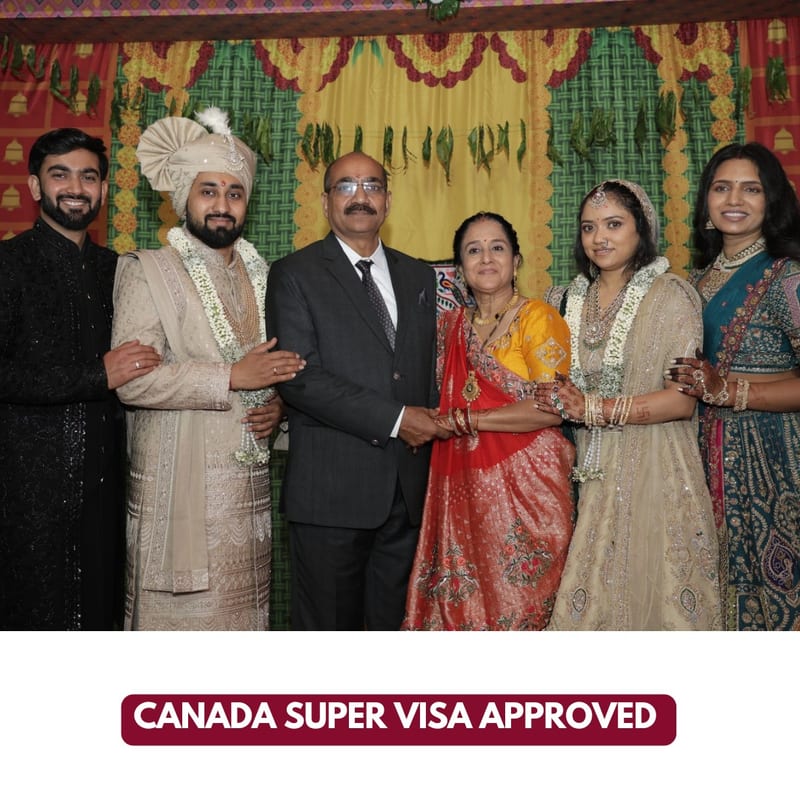 Canada Super Visa approved for an EEC applicant's parents, pictured with family at a wedding