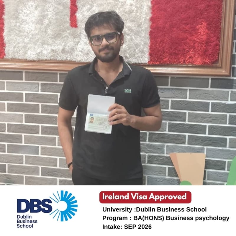 EEC student holding their passport after their Ireland student visa was approved — Dublin Business School, BA (Hons) Business Psychology, September 2026 intake